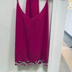 Never worn fuschia top with beautiful white beaded detailing